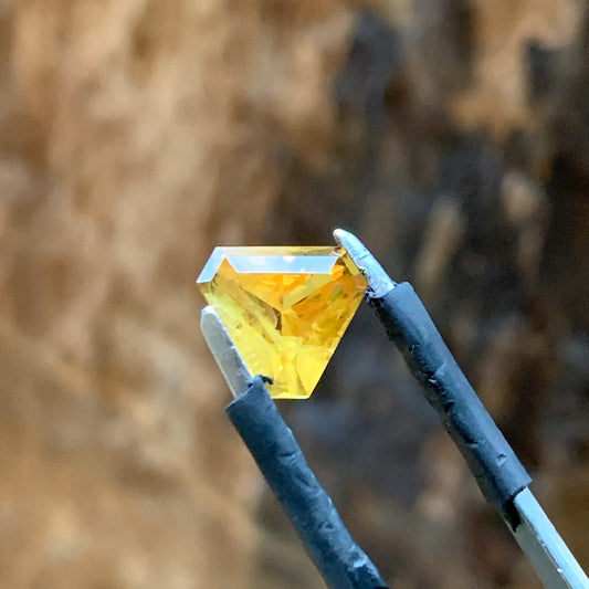 1.71ct Orange sapphire triangle