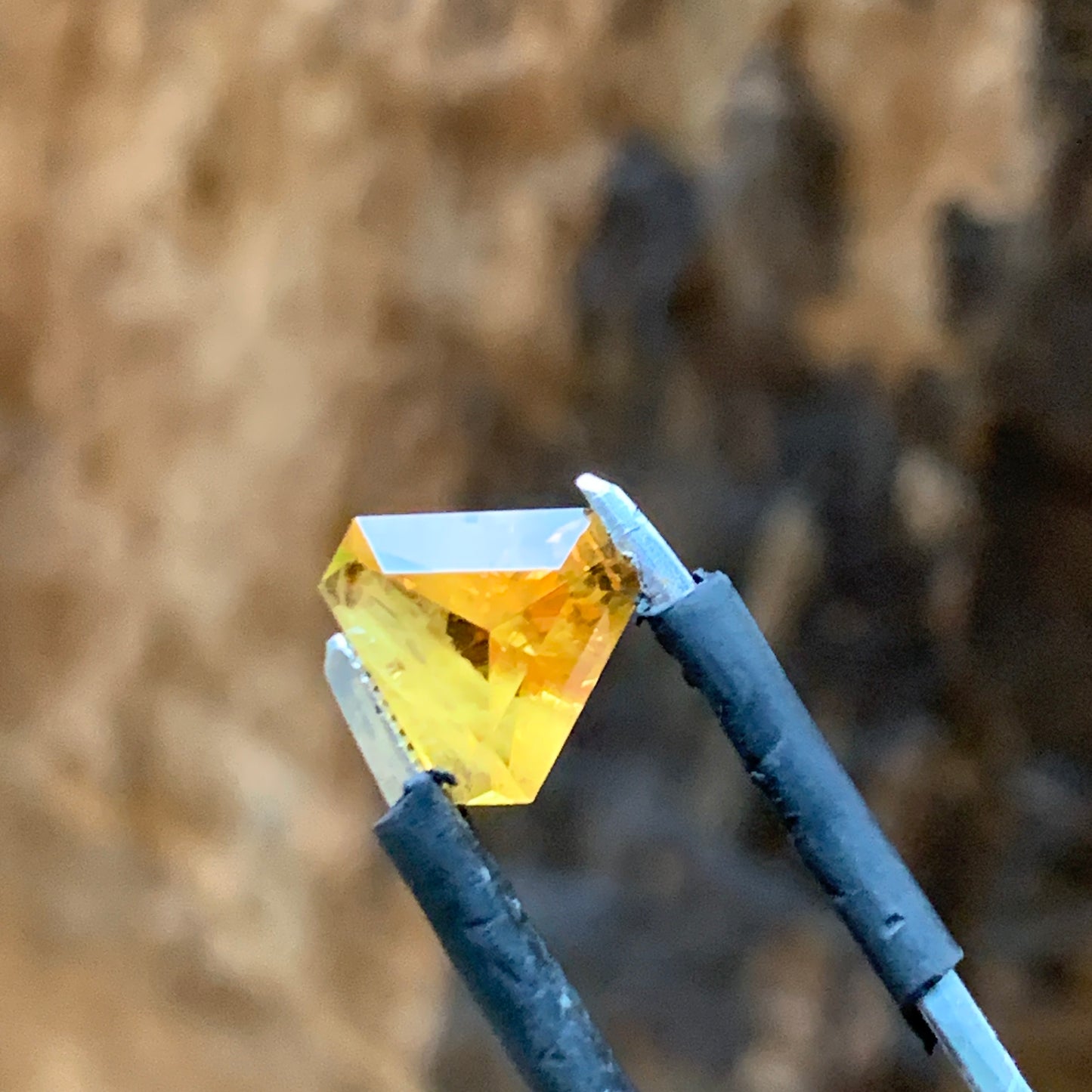 1.71ct Orange sapphire triangle