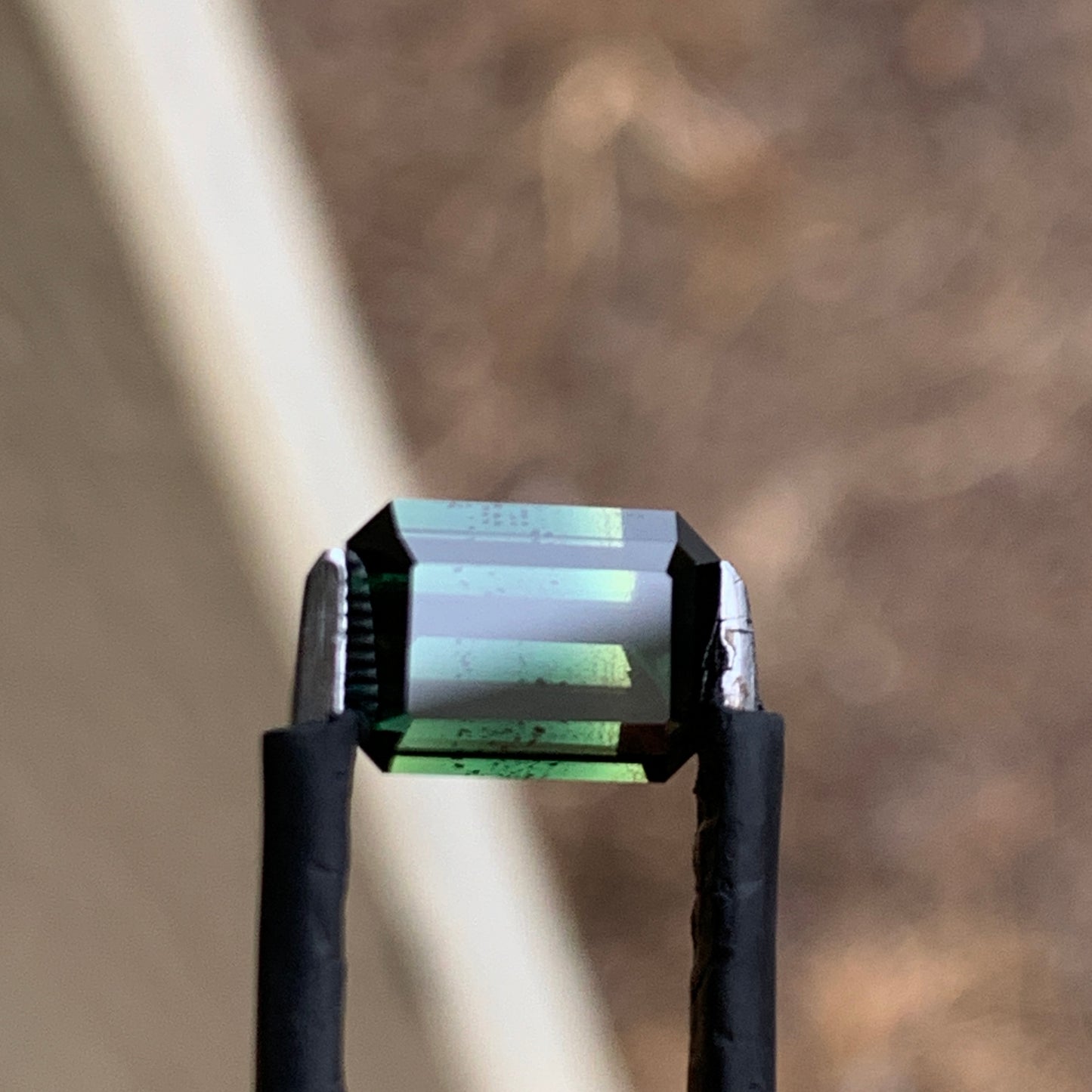 3.46ct green emerald cut australian sapphire