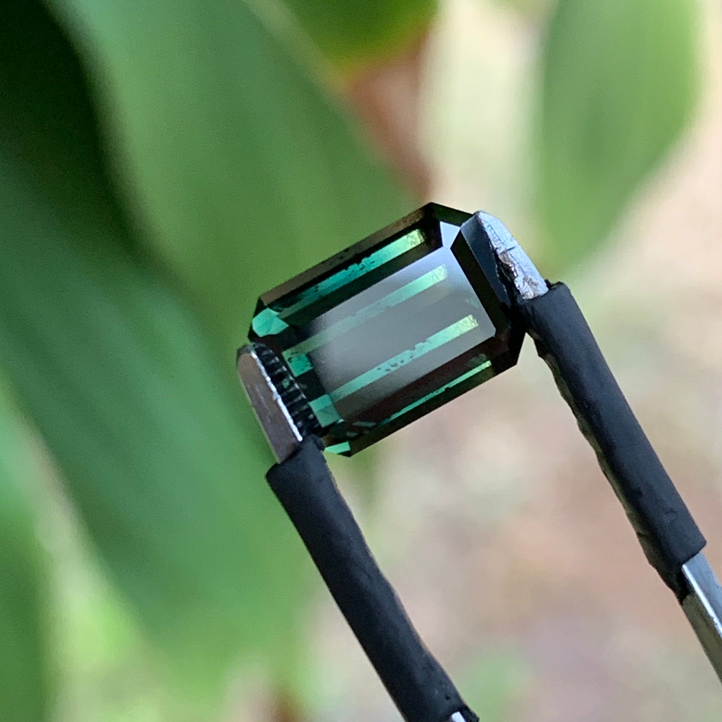 3.46ct green emerald cut australian sapphire