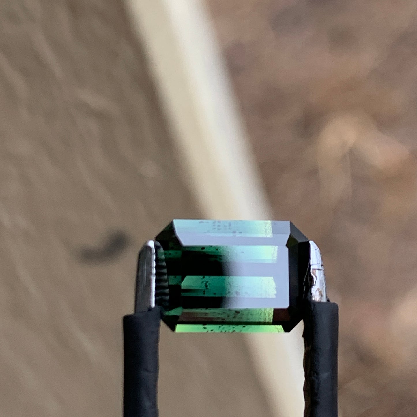 3.46ct green emerald cut australian sapphire