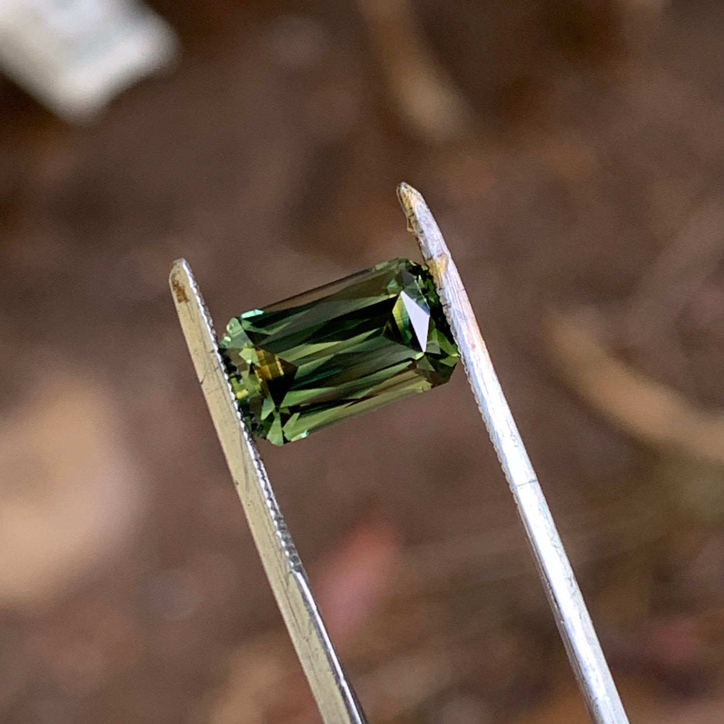 2.34ct forest Green emerald cut Sapphire unheated