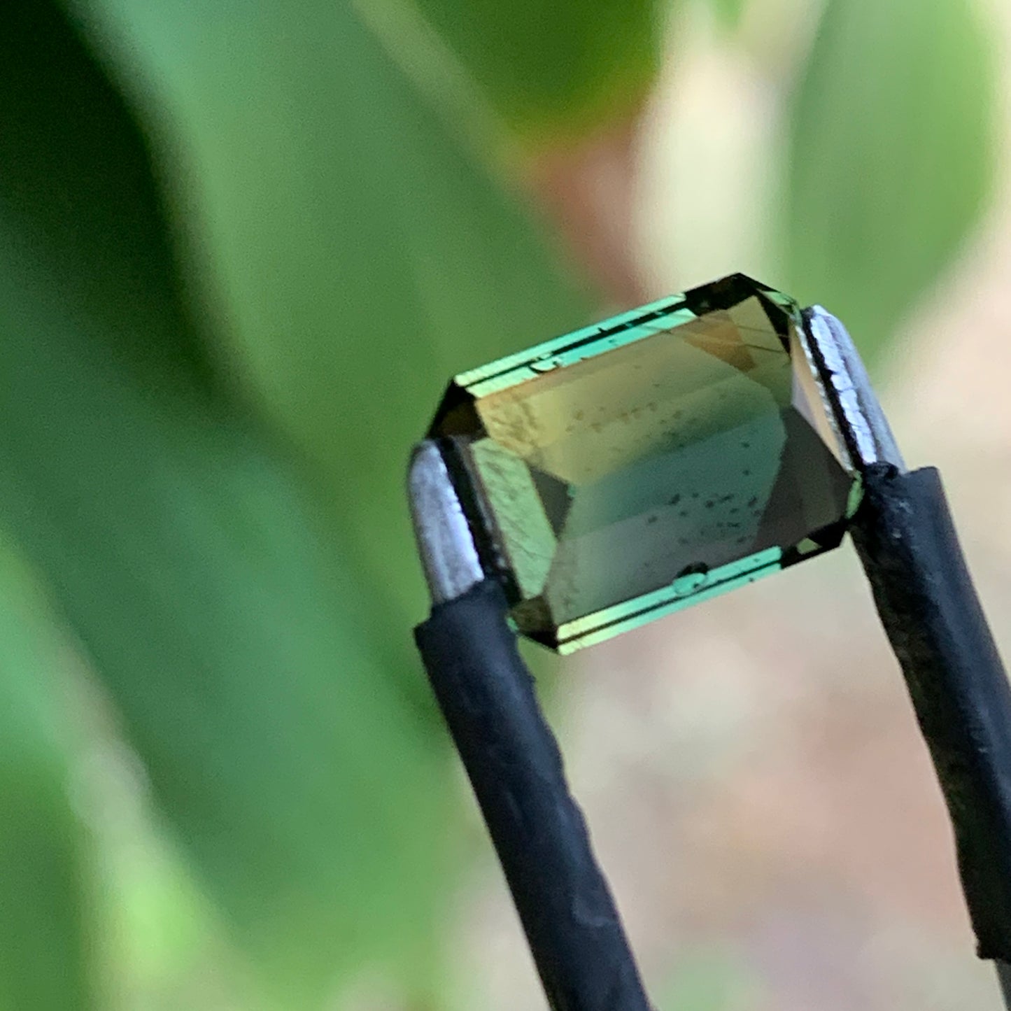 3.46ct green emerald cut australian sapphire