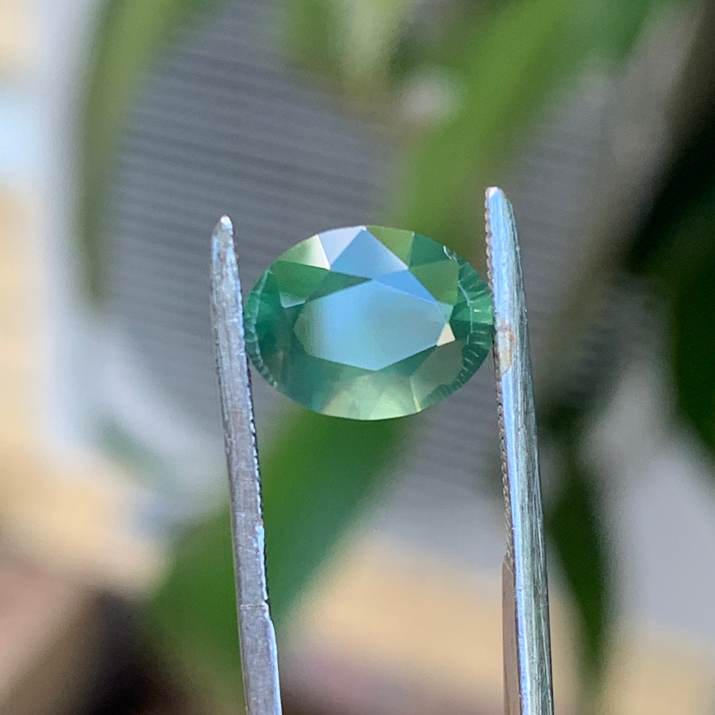 2.3ct opalescent green oval - Australian unheated Sapphire